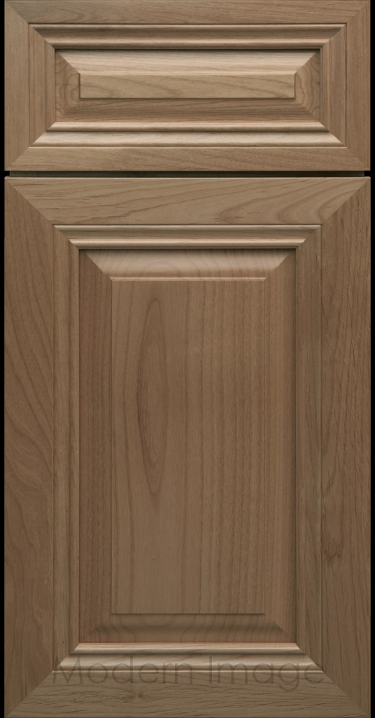 Close-up of a Fawn-stained wood cabinet door with a mitered frame and traditional Cambridge raised center panel.